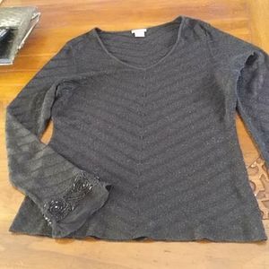 Women's beaded black sweater.